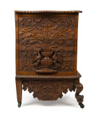 An impressive "ADVANCE AUSTRALIA" oak glory box, profusely carved with kookaburras, snakes, kangaroo and emu flanking a monogrammed crest "J.M.", the interior handsomely adorned with carved bird and swag emblazoned "With Best Wishes", circa 1880 ​95cm hig - 4