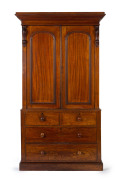 A Colonial Australian cedar gentleman's wardrobe, four drawer base with hanging top, 19th century, 235cm high. 131cm wide, 63cm deep