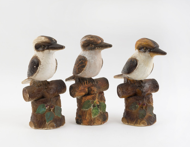 Three kookaburra statues, painted chalk ware, ​29cm high