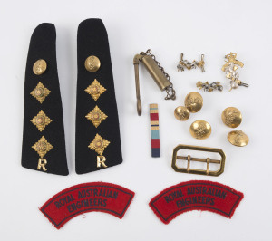 ROYAL AUSTRALIAN ENGINEERS group comprising captain's rank epaulettes, hat and collar badges, Sam Brown belt clasp (by K.G.Luke), 5 buttons, a rifle periscope and two cloth patches. (15 items).