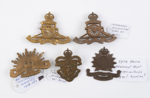 HAT BADGES: Melbourne University Rifles, Australian Artillery (2, one gilt), The Hume Regiment (the 59th), and Australian Military Forces, (5 items).
