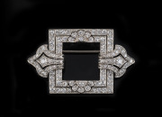 A stunning Art Deco brooch, 18ct white gold set with 104 diamonds (approximately 6.12ct), in original plush fitted box, retailed by R. STEWART of Glasgow. Formerly the property of DAME MARY COOK. 5cm wide, 11.8 grams. PROVENANCE: The Cook family, by desc - 2