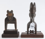 Two African weaving pulleys, carved wood, Baule tribe, Ivory Coast, on later wooden plinths, 18cm and 23cm high overall - 2