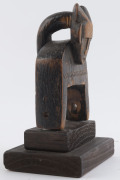 Two African weaving pulleys, carved wood, Baule tribe, Ivory Coast, on later wooden plinths, 18cm and 23cm high overall - 4