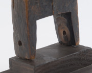 Two African weaving pulleys, carved wood, Baule tribe, Ivory Coast, on later wooden plinths, 18cm and 23cm high overall - 6