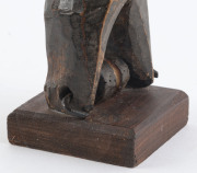 Two African weaving pulleys in the form of horned beasts, carved wood, Baule tribe, Ivory Coast, on later wooden plinths, 18cm and 19cm high overall - 12