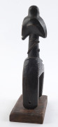 Two African weaving pulleys one with original spool, carved wood, Baule tribe, Ivory Coast, on later wooden plinths, 21cm and 24.5cm high overall - 6