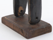 Two African weaving pulleys one with original spool, carved wood, Baule tribe, Ivory Coast, on later wooden plinths, 21cm and 24.5cm high overall - 7