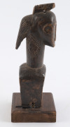 Three African weaving pulleys, carved wood, Baule tribe, Ivory Coast, on later wooden plinths, 17cm, 18cm and 20cm high overall - 4