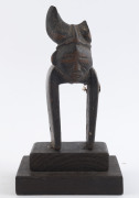 Two African weaving pulleys, carved wood, Baule tribe, Ivory Coast, on later wooden plinths (both loose), 14cm high overall - 3