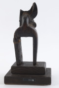 Two African weaving pulleys, carved wood, Baule tribe, Ivory Coast, on later wooden plinths (both loose), 14cm high overall - 5