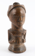 An African female fetish figure, carved wood, Basongye tribe, Southern Congo, 14.5cm high. - 2