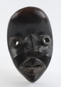 A tribal mask, carved wood with round eyes and dark finish, Dan tribe, Ivory Coast, ​25cm high - 2