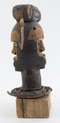 A double sided bust, carved wood and wicker with earth pigment, Ekoi tribe, Nigeria/Cameroon, on later wooden base, ​33cm high overall - 7