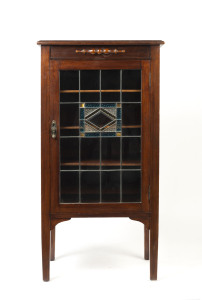 An Australian music cabinet, Tasmanian oak with leadlight door, early 20th century, 117cm high, 61cm wide, 41cm deep