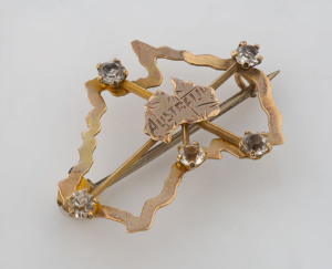Federation period Southern Cross and map of Australia brooch, 9ct gold and rhinestone, circa 1900, stamped "9ct", 3cm wide