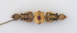 WILLIS & SONS (Melbourne), antique 9ct gold bar brooch set with red stone, 19th century, stamped "9.W" with unicorn mark, 5.2 cm wide, 2.9 grams