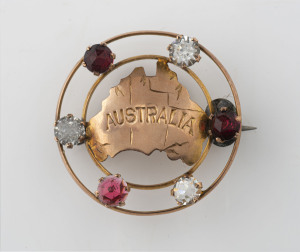 Federation period map of Australia brooch, 9ct rose gold and rhinestone, circa 1900, stamped "9ct", with pictorial marks, 3cm diameter