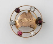Federation period map of Australia brooch, 9ct rose gold and rhinestone, circa 1900, stamped "9ct", with pictorial marks, ​3cm diameter