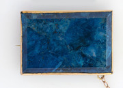 A 10ct gold brooch set with large polished lapis lazuli specimen, 20th century, ​3.5cm wide