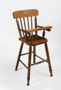 A kangaroo back child's high chair, early 20th century, 88cm high, 32cm across the arms