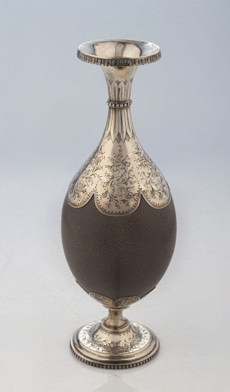 An Australian emu egg ornament with engraved silver plated mounts, 19th century, 25cm high