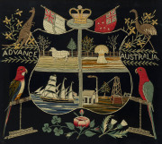 A stunning "ADVANCE AUSTRALIA" wool work coat of arms showing scenes of Australian industry including mining, shipping, wool and wheat surrounded by a kangaroo and emu, king parrot and rosella, crested with flags and a crown. The lower section displaying