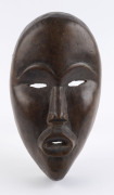 A ceremonial mask, carved wood, Dan tribe, Ivory Coast, ​23cm high - 2