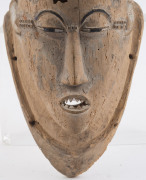 A mask with elaborate head dress and pointed teeth, carved wood and remains of polychrome finish, Guro tribe, Ivory Coast, ​43cm high - 4