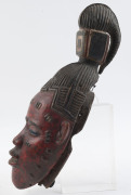 A mask with stylized top knot, carved wood with red and black painted finish, Guru tribe, Ivory Coast, ​40cm high - 4