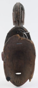 A mask with stylized top knot, carved wood with red and black painted finish, Guru tribe, Ivory Coast, ​40cm high - 5
