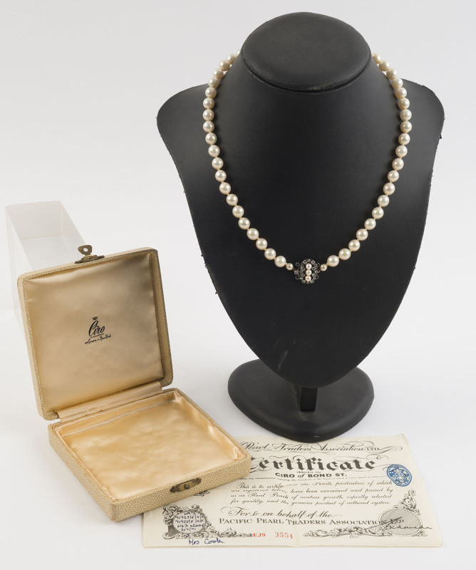 A Japanese Akoya single strand pearl necklace (8-8.5mm), silver clasp set with pearls and white sapphires, in original box with retailer's mark and certificate (made out to Mrs. Cook) "CIRO Of Bond Street London & New York". Formerly the property of DAME