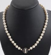 A Japanese Akoya single strand pearl necklace (8-8.5mm), silver clasp set with pearls and white sapphires, in original box with retailer's mark and certificate (made out to Mrs. Cook) "CIRO Of Bond Street London & New York". Formerly the property of DAME - 2