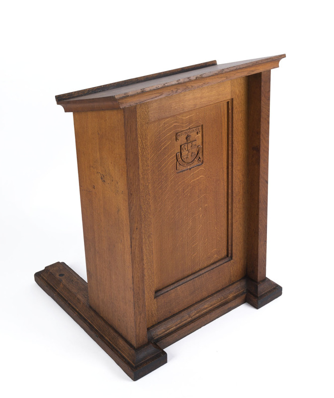 A chapel prayer lectern, oak, 19th century, carved with the Melbourne coat of arms and emblazoned "The Royal Women's Hospital, Melbourne" 83cm high, 59cm wide, 60cm deep