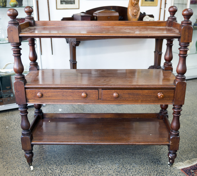 An Australian cedar three tier dumbwaiter with two drawers, South Australian origin, circa 1855, 124cm high, 123cm wide, 49cm deep