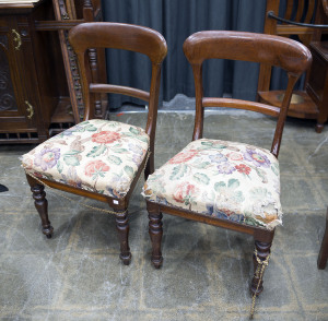 Two Australian cedar dining chairs with floral linen upholstery, 19th century,