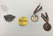 BADGES & MEDALETTES: 1916 Department of Education Victoria bronze ANZAC medal; 1918 Department of Education Victoria silver ANZAC Day medal; 1919 ANZAC Remembrance Day badge (by Stokes); sterling silver nurses' rising sun badge (by Luke). (4 items). - 2