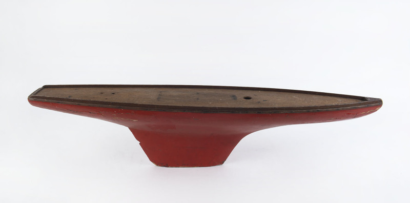 A vintage pond yacht hull with red painted finish, early 20th century, ​110cm long