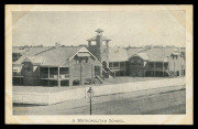 QUEENSLAND - Postal Stationery : POSTAL CARDS (VIEWS) - OFFICIAL: Advice Card 'Proof' for the Department of Public Instruction with black & white view 'A Metropolitan School', without stamp impression, postally used with 'PAID/BRISBANE/29AP15' datestamp,