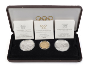 GOLD - world : AUSTRIA: 1896-1996 Olympics Centenary three-coin presentation set comprising 22k gold 1000sch coin weight 16.97g, plus two sterling silver 200sch coins, each weighing 33.63gr, in original presentation case (some damage); Unc.