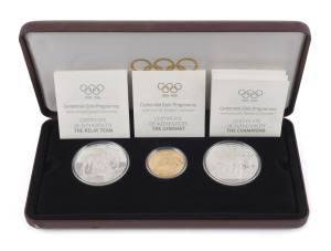 Gold : 1896-1996 Olympics Centenary, another example of this three-coin presentation set celebrating "Friendship & Fair Play", comprising 22k gold $200 coin weight 16.97g, plus two sterling silver $20 coins, each weighing 33.63gr, in original presentation case with box; Unc.