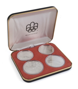SILVER - world : CANADA:1979 Montreal Olympics commemorative silver coins sets (7), each set containing sterling silver $5 coins (2) & $10 (2), each $5 coin containing 22.39gr of fine silver, and each $10 coin containing 44.78gr of fine silver; all in original presentation cases, one set with out cardboard sleeve & a single damaged coin capsule; Unc. with total fine silver weight 940gr.