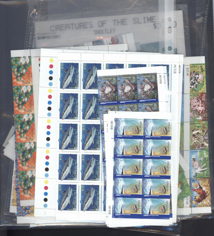 Decimal Issues : POSTAGE: circa 2005 accumulation with sheetlets, se-tenant strips, large multiples, booklets, International stamps, also a few FDCs, total MUH face value $1190+. (100s)