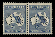 Kangaroos - Third Watermark : 2&frac12;d Indigo, horizontal pair, (2) perforated OS; the right hand unit additionally with variety BW:11(1)d "Break in inner top frame over R of AUSTRALIA", fresh MUH.