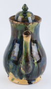BENDIGO POTTERY Colonial coffee pot and cover with bold mottled green, blue and brown glaze, circa 1880, extremely rare.A less striking and the only other known example is housed by the National Gallery of Australia (purchased in 1988).26cm high - 5