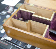 A Colonial violin case, kauri pine inlaid with cedar, myrtle and huon pine, Tasmanian origin, 19th century, attractively fitted interior with original velvet lining, ​15cm high, 79cm wide, 24cm deep - 12