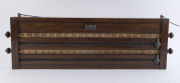 ALCOCK, THOMSON & TAYLOR blackwood billiards scoreboard, rack and cues, early 20th century, the board 95cm high, 30cm wide, 7cm deep - 2