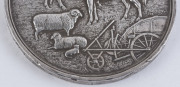 "THE ROYAL AGRICULTURAL AND HORTICULTURAL SOCIETY OF SOUTH AUSTRALIA" silver medal (70mm) by J.S.& A.B. Wyon, inscribed around edge "Awarded To J. Fewings For Land Grading Machine, 1904", 142 grams - 3