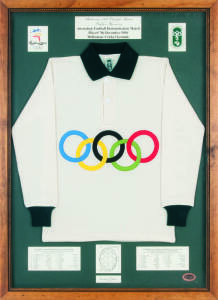 Sydney 2000/AFL display comprising Replica Guernsey (white with Olympic Rings in colour on front) as used in the Australian Football Demonstration Match played at the MCG during the 1956 Melbourne Olympics, limited edition 930/2000, attractively mounted, 