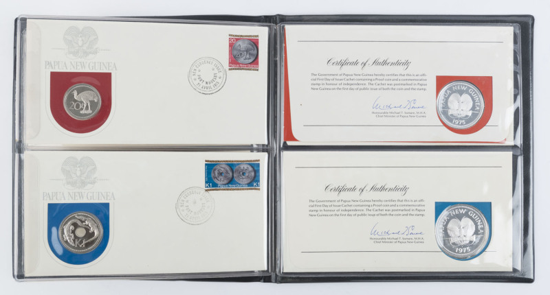 Papua New Guinea - Coins : 1975 Independence 1t to 5k proof currency PNCs, including 5k coin containing of 27.6gr of 50% silver and 10k coin containing 41.6gr of 92.5% silver; all neatly displayed in presentation binder. (8 PNCs)